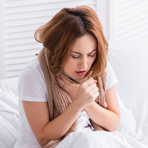 woman coughing